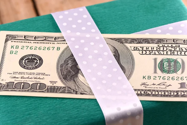 American money and green gift box — Stock Photo, Image