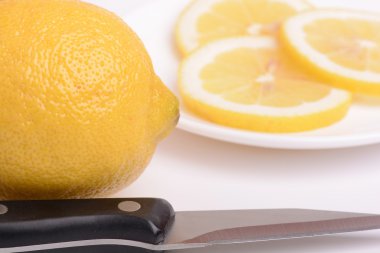 Fresh lemon and knife