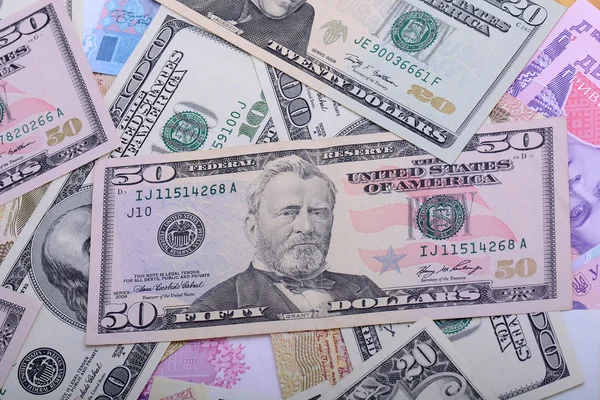 พื้นหลังด้วยเงิน ดอลลาร์อเมริกันบิล — ภาพถ่ายสต็อก