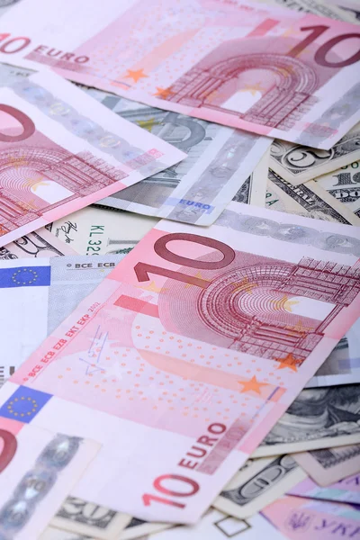 Euro-bankbiljetten. Europese en Amerikaanse geld achtergrond — Stockfoto