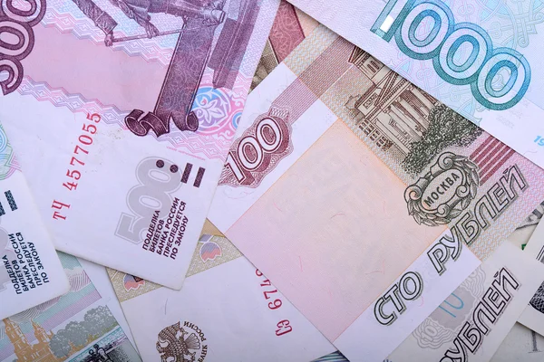 Russische geld achtergrond. roebels bankbiljetten close-up textuur — Stockfoto