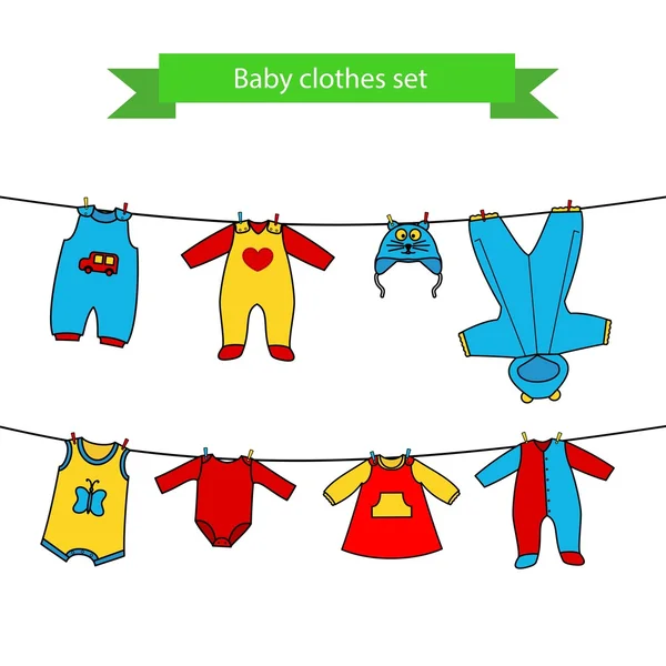 Conjunto de roupas fofas para o bebê no varal . —  Vetores de Stock