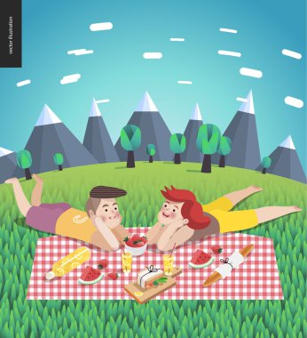 Young couple on picnic, blue sky