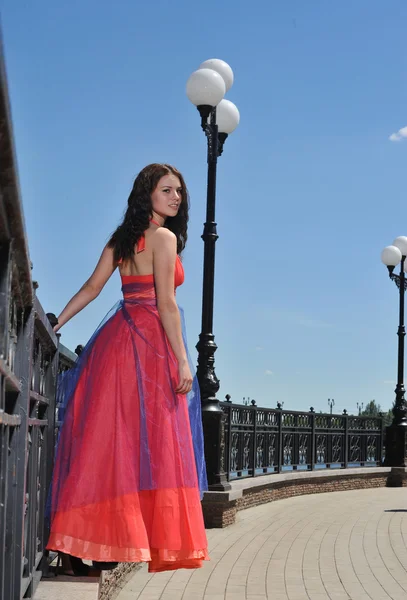 Girl in dress on the street — Stock Photo, Image