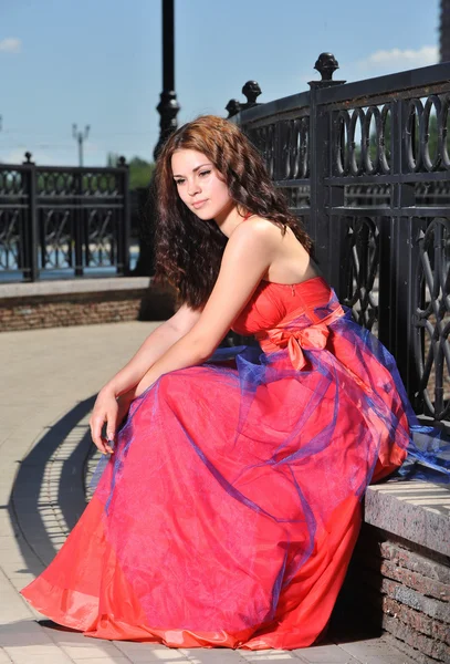 Girl in dress on the street — Stock Photo, Image