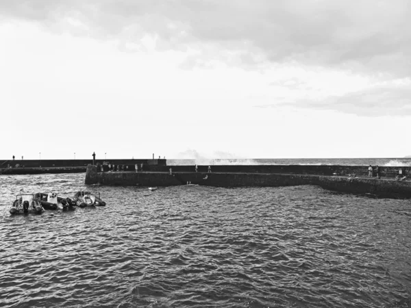 People swimming in the harbor of Puerto de la Cruz — Stock Photo, Image