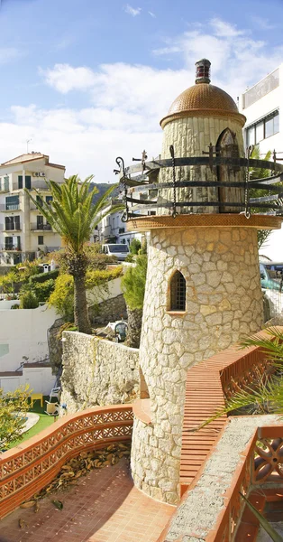 Gradens with ornamental lighthouse — Stock Photo, Image