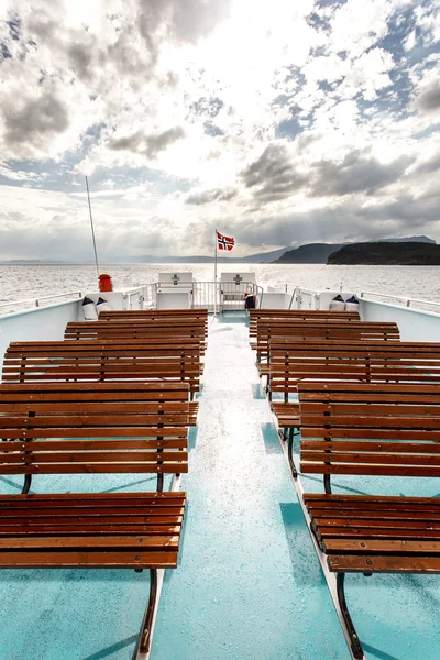 Free seat on the deck of the ferry in Norway