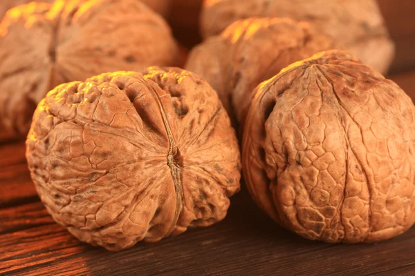 Walnuts on an old table — Stock Photo, Image