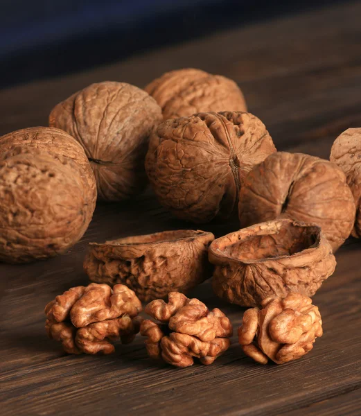 Walnuts on an old table — Stock Photo, Image