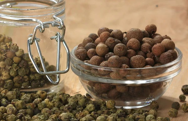 Allspice on a brown  background — Stock Photo, Image