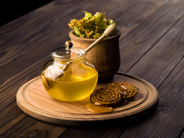 Honey on a brown table — Stock Photo, Image