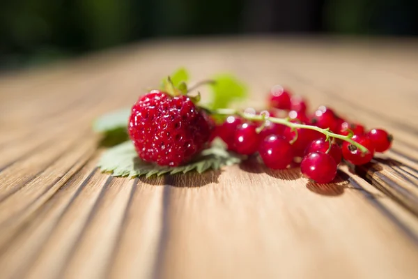 Strawberry on a wooden table — Stock Photo, Image