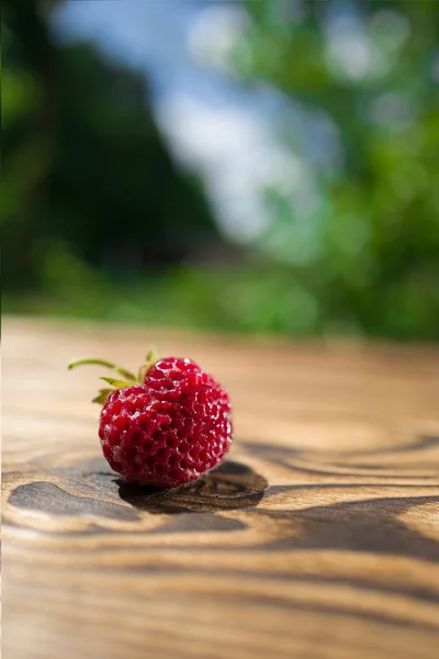 Strawberry on a wooden table — Stock Photo, Image