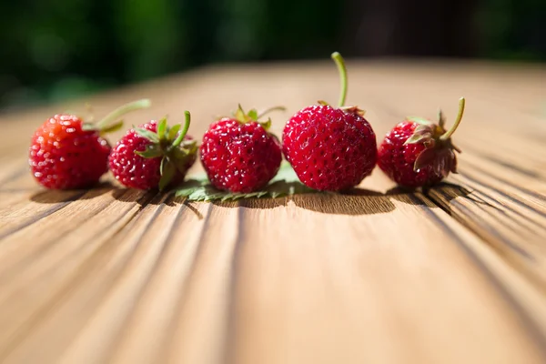 Strawberry on a wooden table — Stock Photo, Image