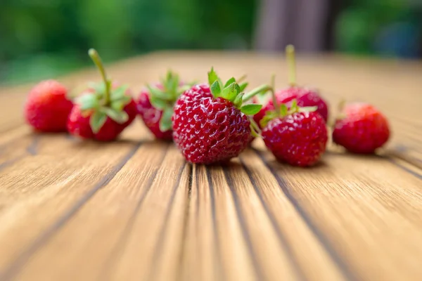 Strawberry on a wooden table — Stock Photo, Image