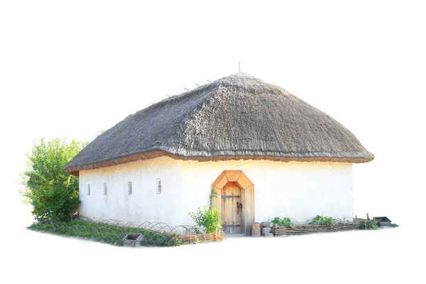 Vecchia casa sotto un tetto di paglia — Foto Stock