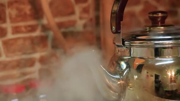 Boiling teapot in kitchen — Stock Video