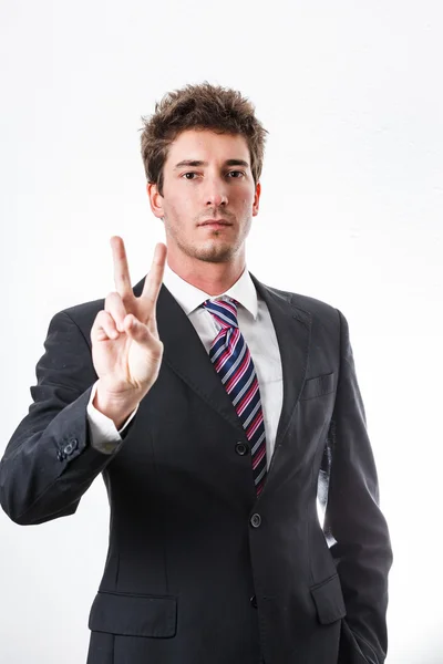 Young businessman showing gesture and facial expression — Stock Photo, Image