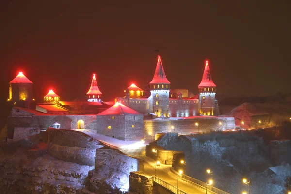 View of the night castle in Kamenetz-Podolsk in Ukraine.