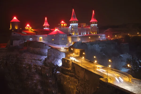 The medieval castle on top of a cliff at night. — Stock Photo, Image