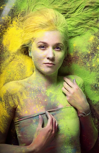 Girl with colored powder — Stock Photo, Image