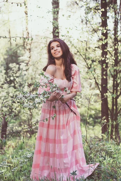 Menina bonita em um vestido rosa — Fotografia de Stock