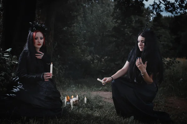 Witch in a dark forest — Stock Photo, Image