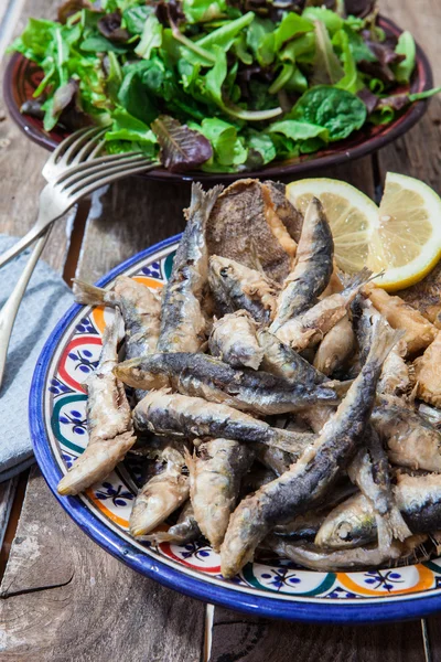 Fried fish on plate — Stock Photo, Image