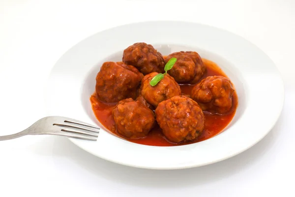 Meatballs on tomato — Stock Photo, Image