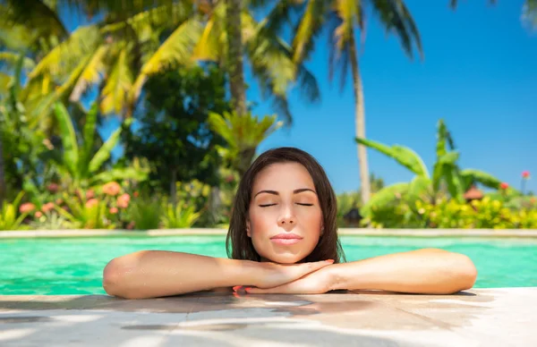 Calm female in the pool Stock Picture