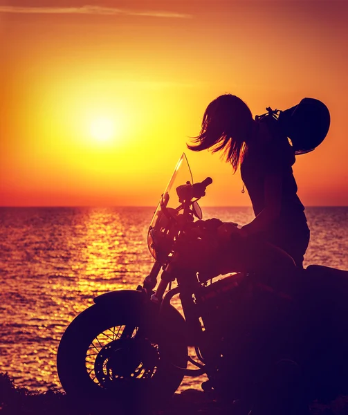 Silhouette of a biker woman — Stock Photo, Image