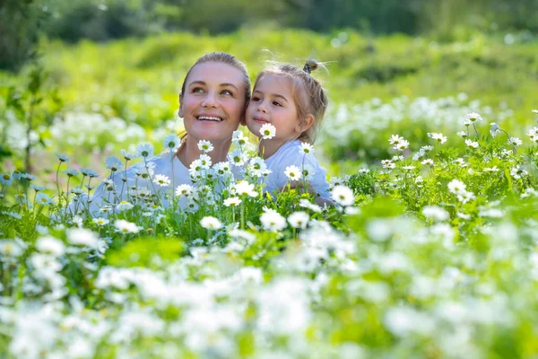 Mother and Son on Flowers Field — Stock Photo, Image