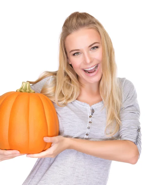 Mujer alegre con calabaza festiva — Foto de Stock