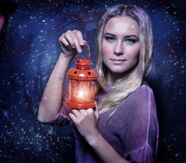 Cute female with glowing lantern — Stock Photo, Image