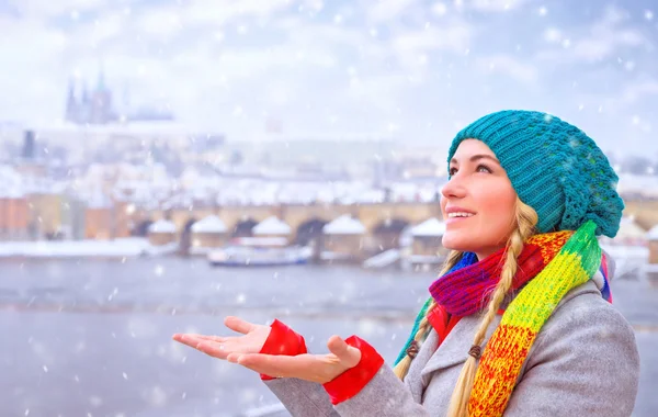 Happy woman enjoy snowfall — Stock Photo, Image