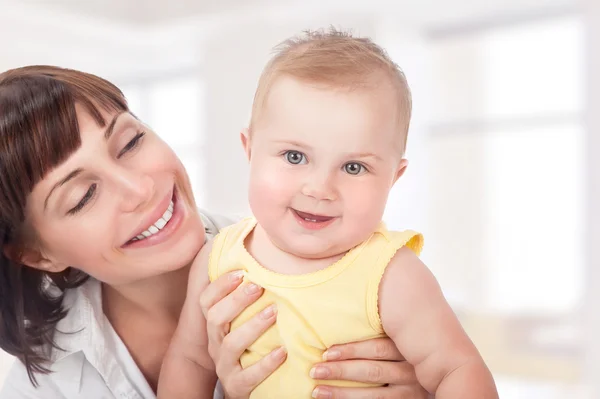 Happy mother with baby Stock Picture