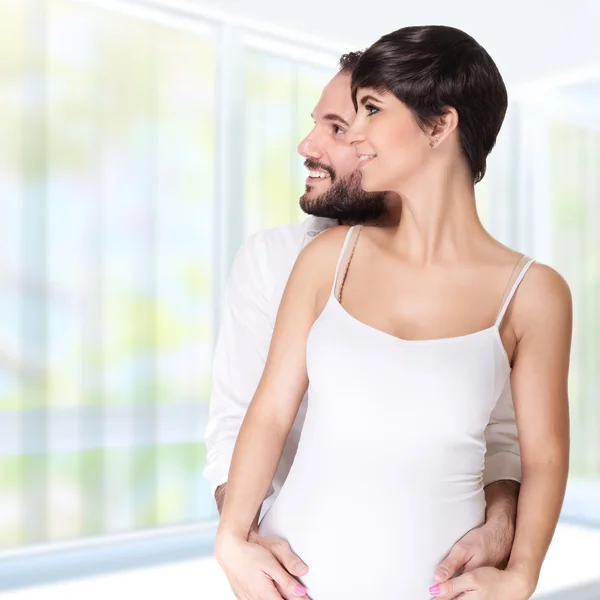 Gravid kvinne med mann – stockfoto