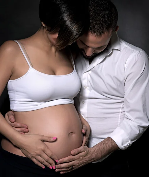 Ung familie venter baby - Stock-foto