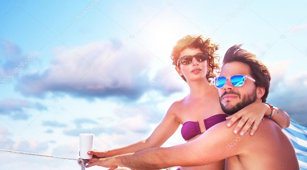 Active couple on the sailboat
