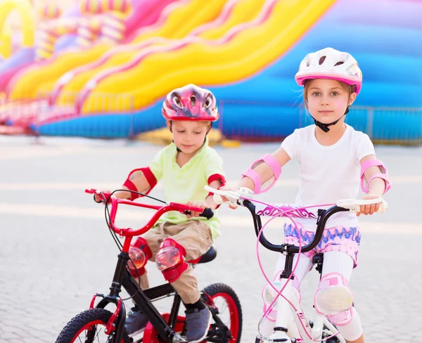 Happy friends on the bicycles — Stock Photo, Image