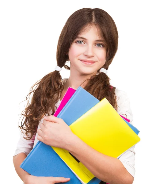 Милая школьница с красочными книгами — стоковое фото