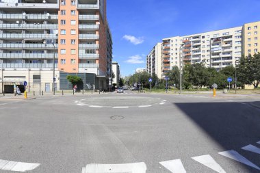Warsaw, Poland - August 05, 2020: A small roundabout by the buildings of a housing estate called Goclaw.