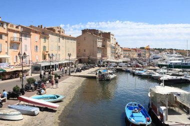 Saint-Tropez, France - July 08, 2009: Marina with boats. There are houses located almost directly by the Mediterranean Sea. This place is one of the most visited on the French Riviera.