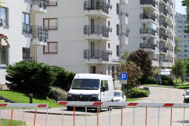 Warsaw, Poland - May 29, 2020: An automatically controlled barrier controls the entrances to residential buildings of a housing estate locally called Goclaw