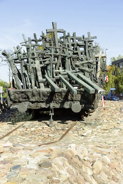 Symbolic crosses loaded on to railway wagon — Stock Photo, Image