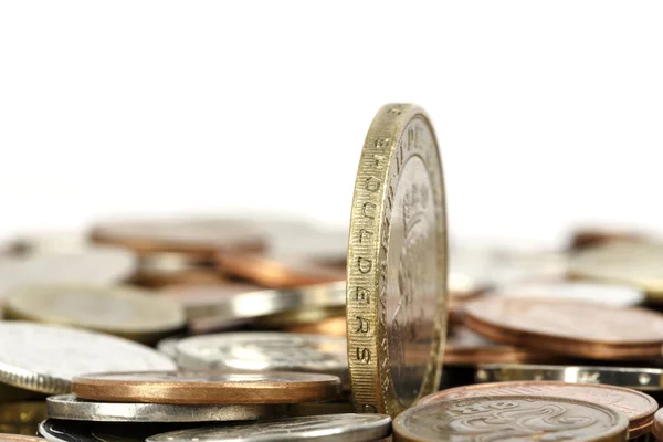 One coin towers over other — Stock Photo, Image