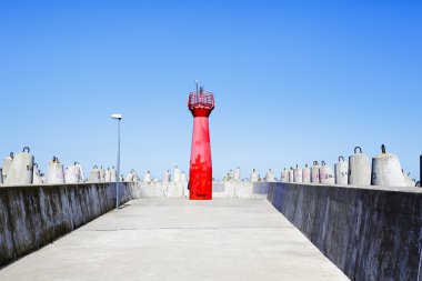 Red signal navigation lantern in Kolobrzeg, Poland