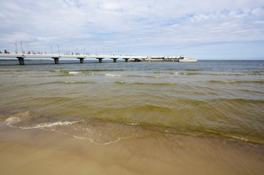 The pier built on the waters of the Baltic Sea