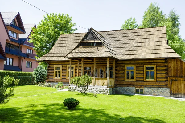 The hut built of wood in Zakopane in Poland — 图库照片